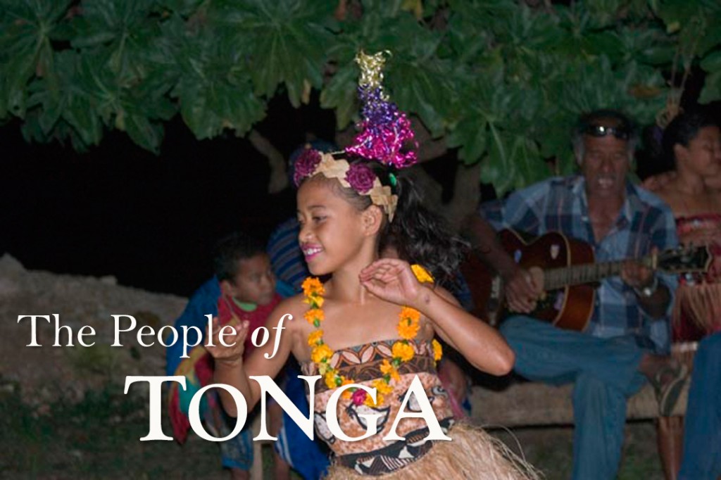 A beautiful local dancer in traditional outfit in Tonga, photographed by Scott Portelli on tour with Swimming with Gentle Giants